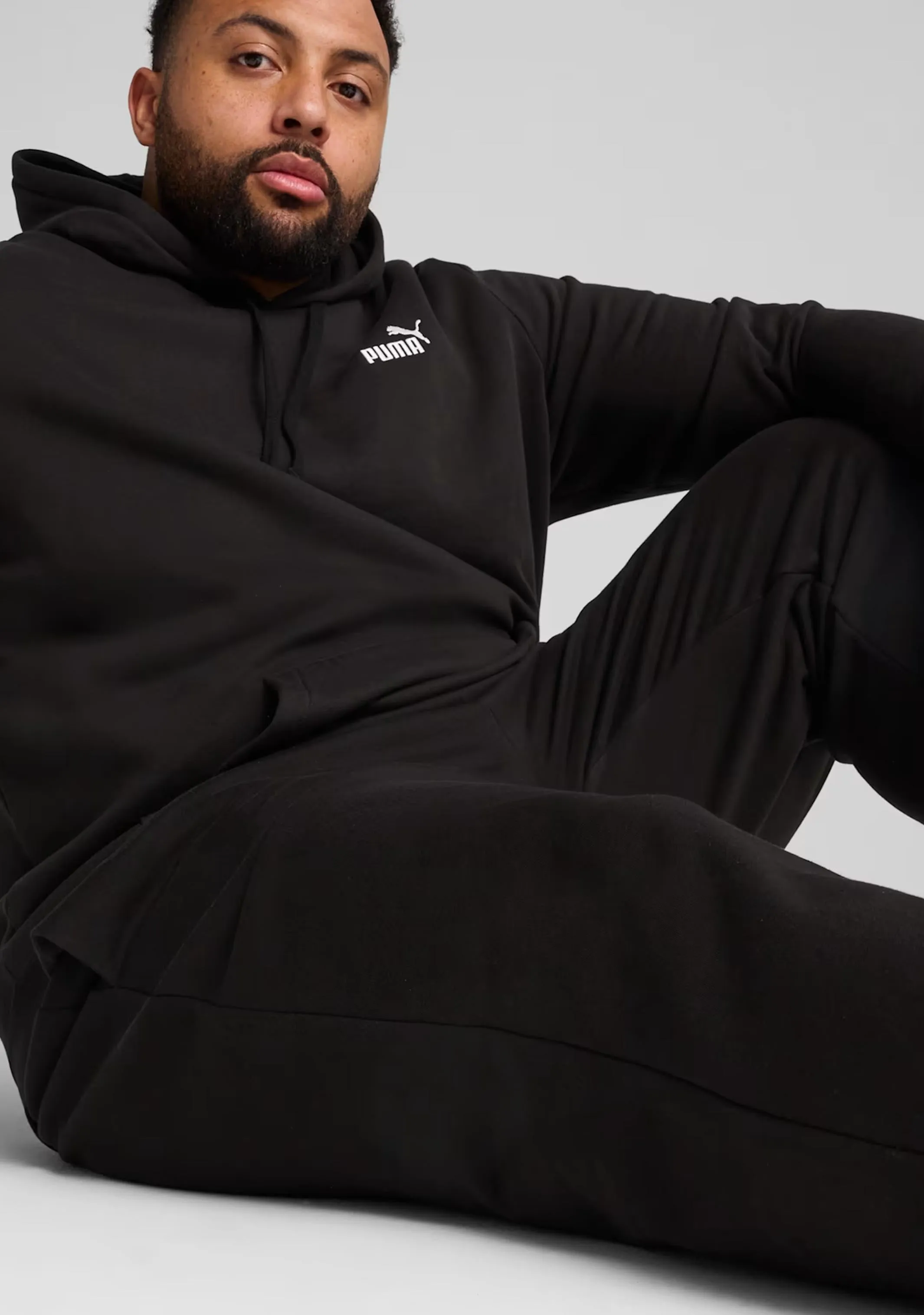 Puma Men's ESS Logo Open Hem Sweatpants Black