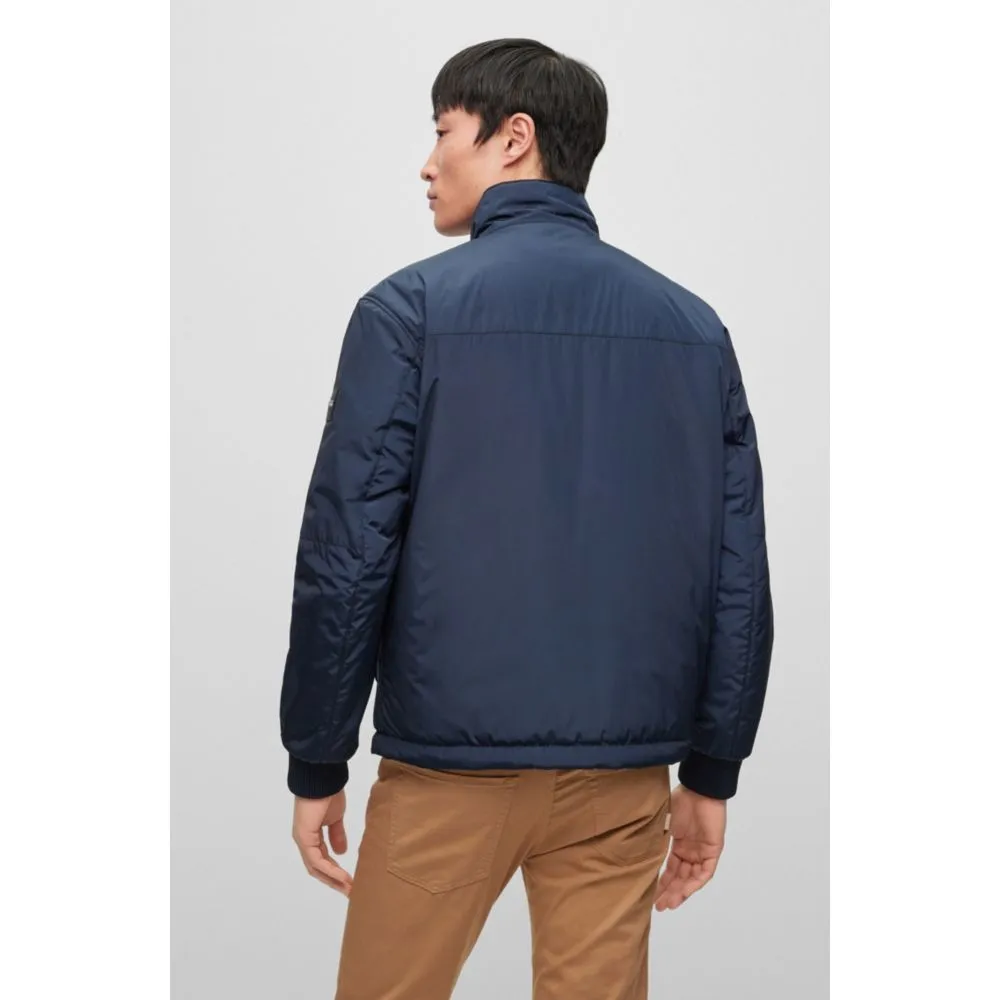 Water-repellent reversible jacket with logo badge